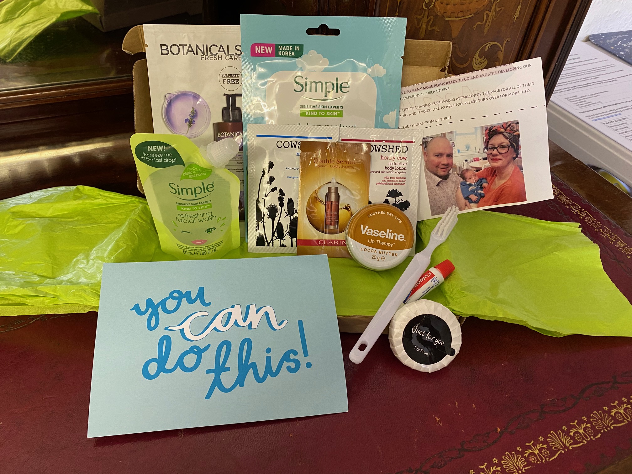A hand-prepared care pack with a soft blanket, teddy bear, toiletries and a thank-you card